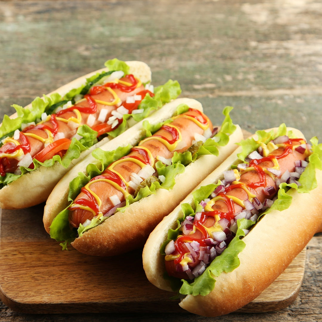 BOURBON INFUSED HOT DOGS IN BUN WITH CONDIMENTS