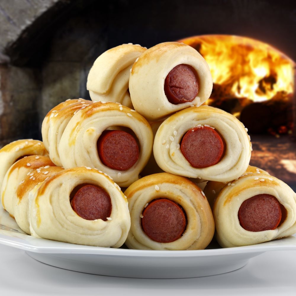 RUM INFUSED SAUSAGE AS LARGE PIGS IN THE BLANKET