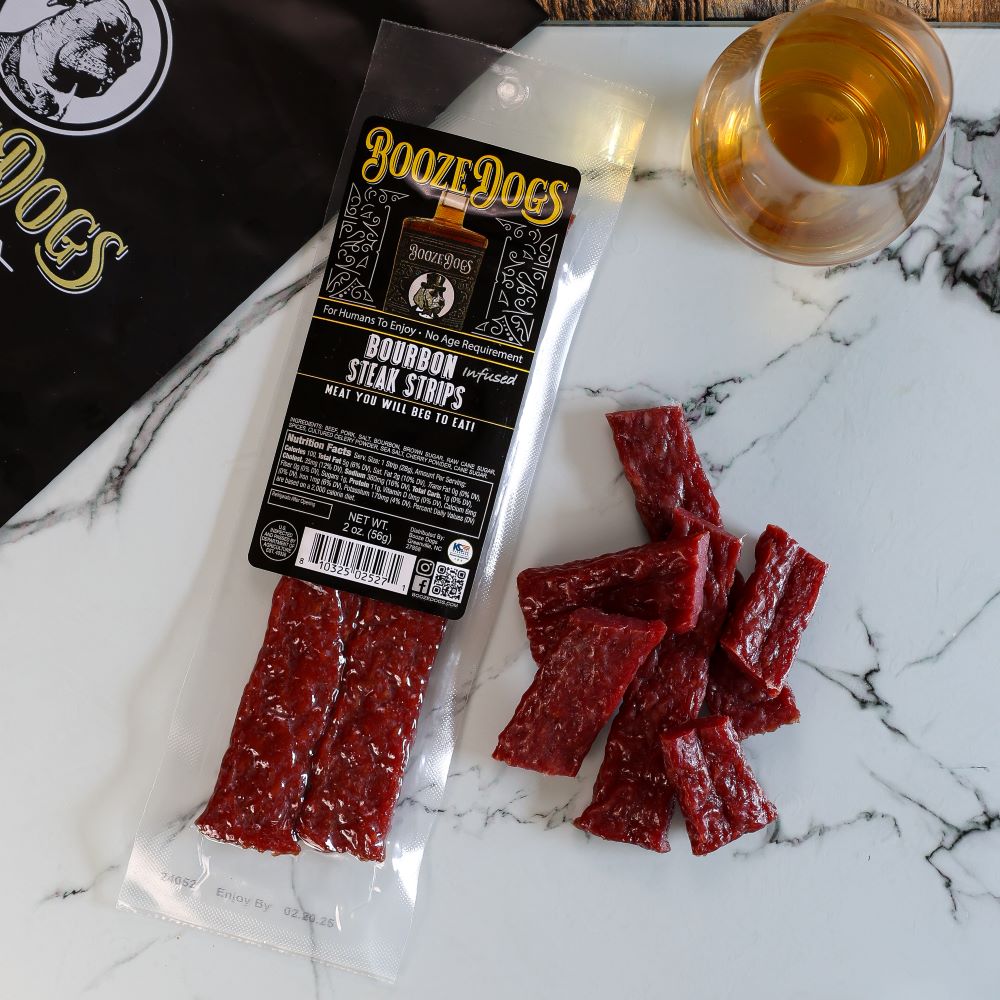 2 OZ PACK OF BOURBON INFUSED JERKY STYLE STEAK STRIPS WITH CUT PIECES
