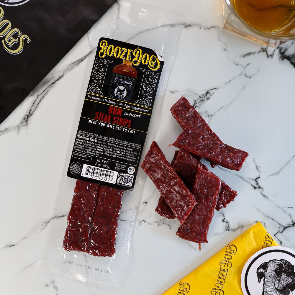 2 OZ PACK OF RUM INFUSED JERKY STYLE STEAK STRIPS WITH CUT PIECES