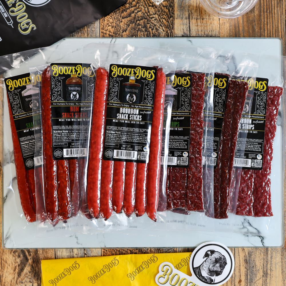 36 OZ VARIETY PACK OF BOURBON, GIN, RUM INFUSED JERKY STEAK STRIP AND SNACK STICKS