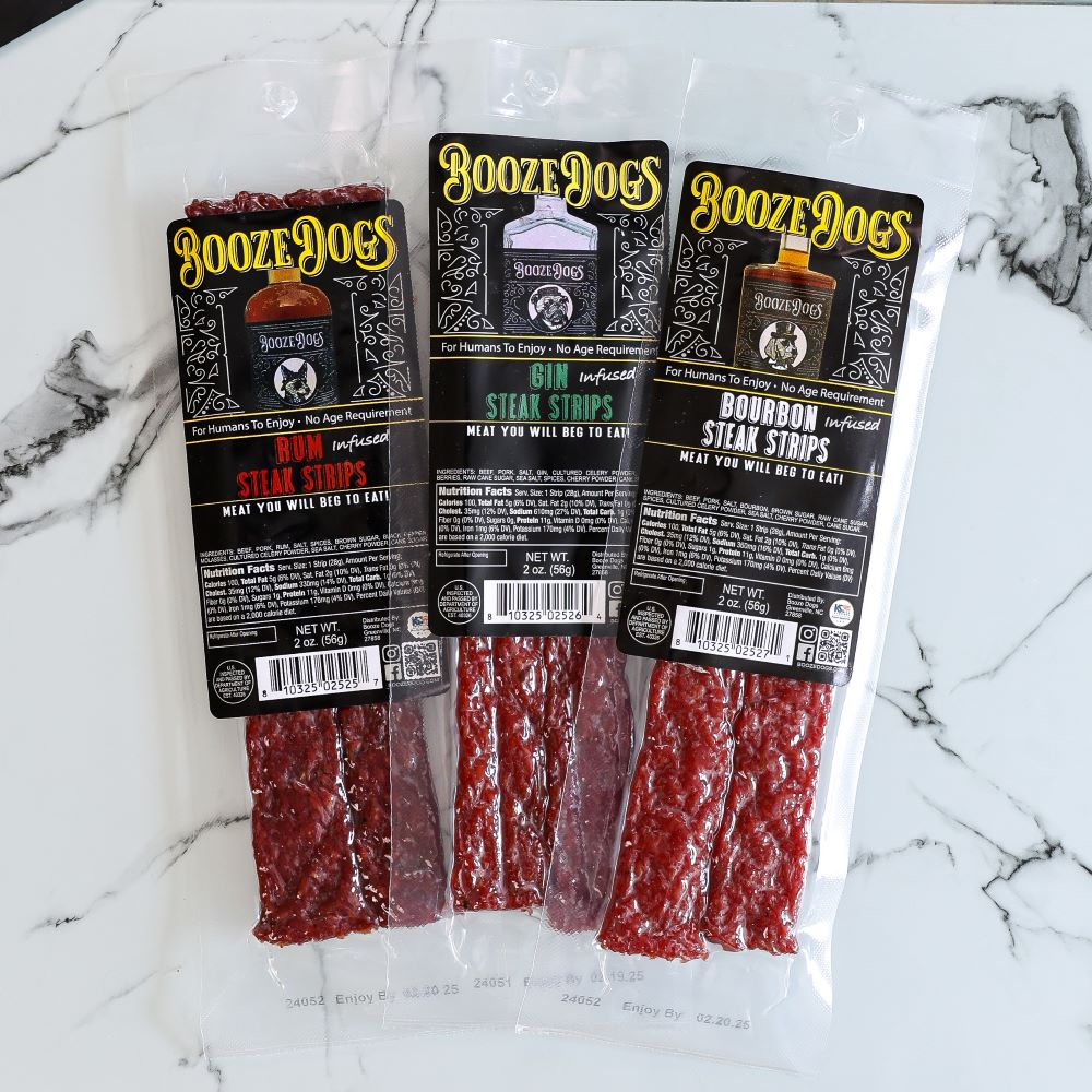 6 OZ VARIETY PACK OF BOURBON, GIN, RUM INFUSED JERKY STYLE STEAK STRIPS