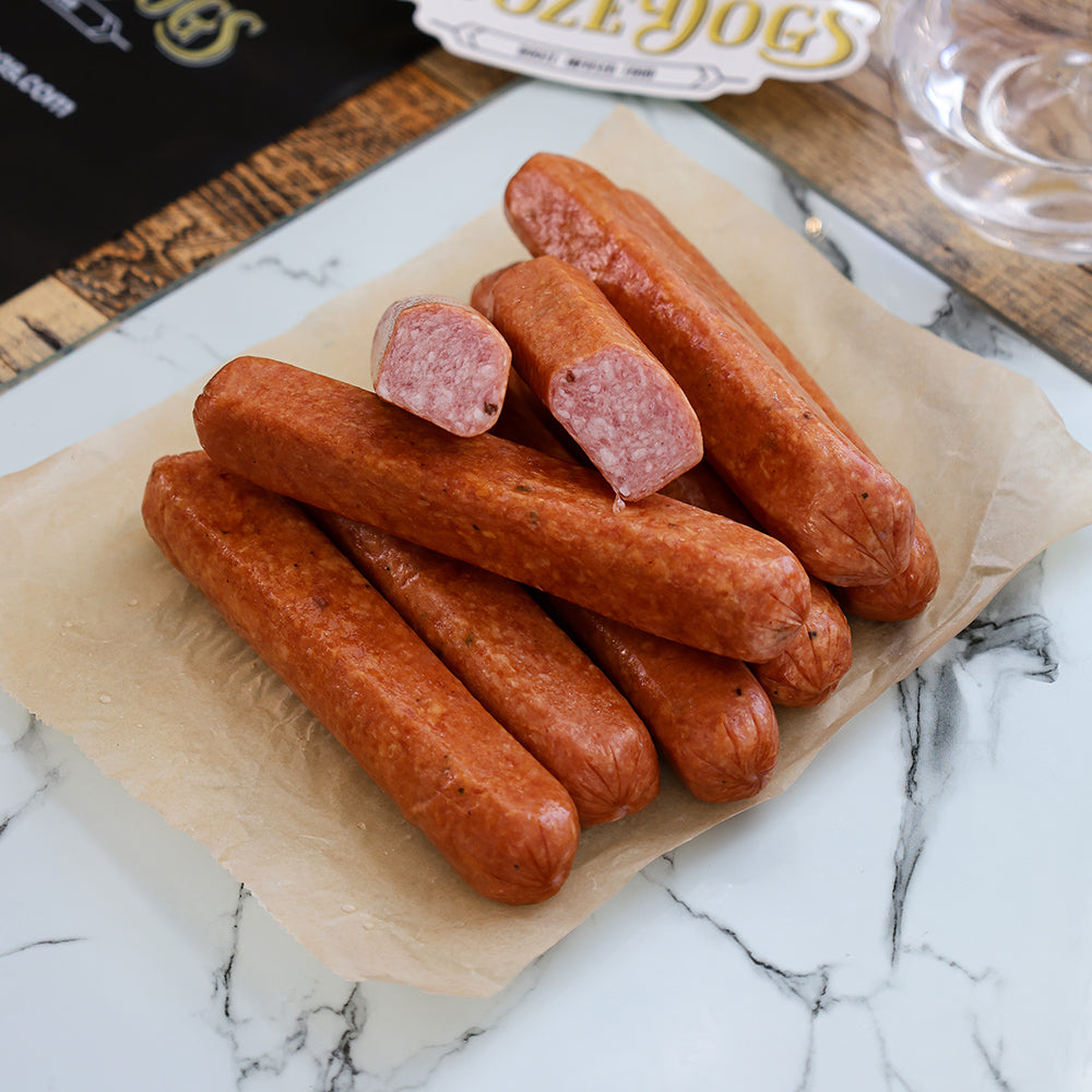 CUT LINKS OF GIN INFUSED HOT DOGS